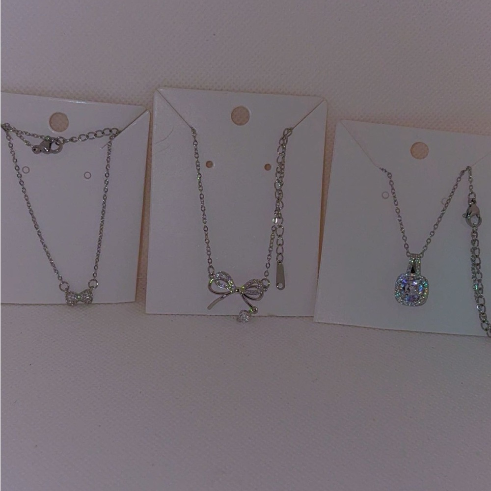 Silver Tone Bow and Cubic Zirconia Pendant Necklace - Silver